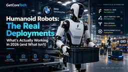 Humanoid robot lifting a plastic tote in a busy warehouse beside a conveyor belt and human workers in safety vests